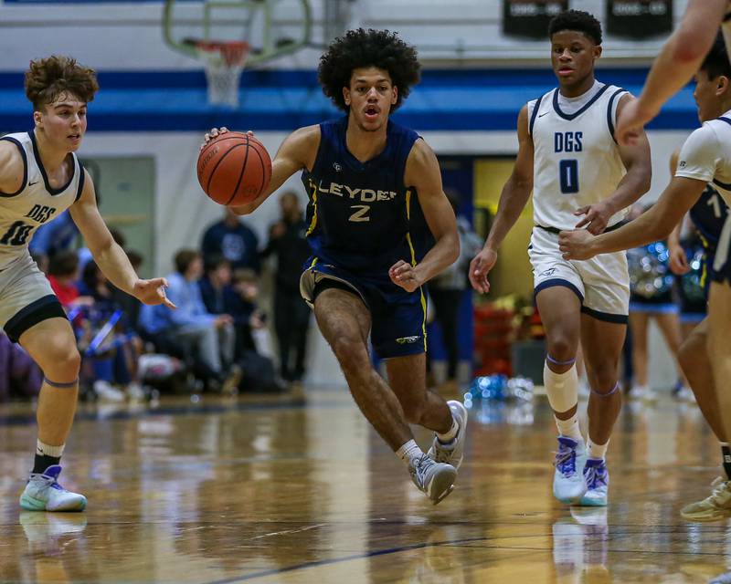 Leyden's Drelyn Jones (2) drives to the basket during basketball game between Leyden at Downers Grove South. Feb 9, 2024.