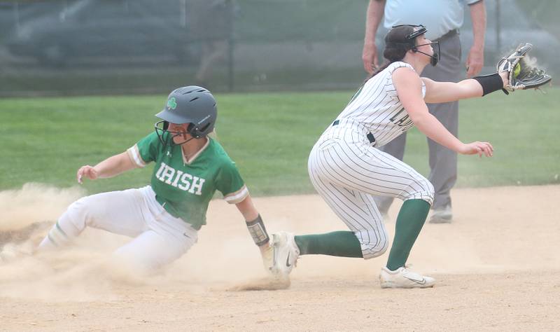 Seneca's Alyssa Zellers slides in safe to second base as St. Bede's Morgan Mercer makes the late catch