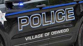Woman found dead inside Oswego home, suspect in custody
