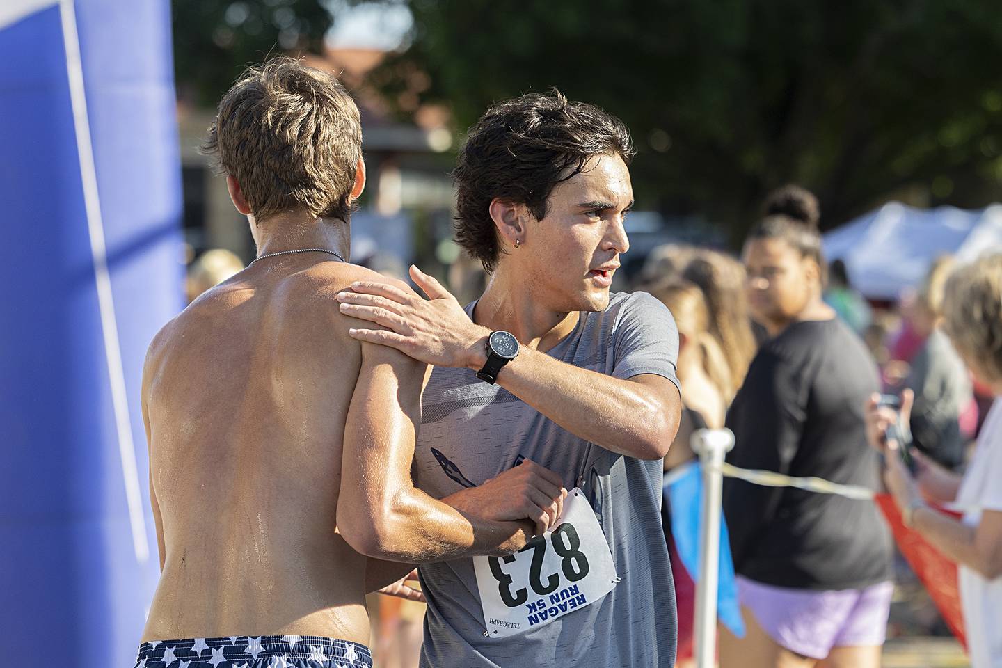 Alberto Campa (right) congratulates winner Tommy Murray after taking second in the Reagan Run 5K on Saturday, July 6, 2024, in Dixon.