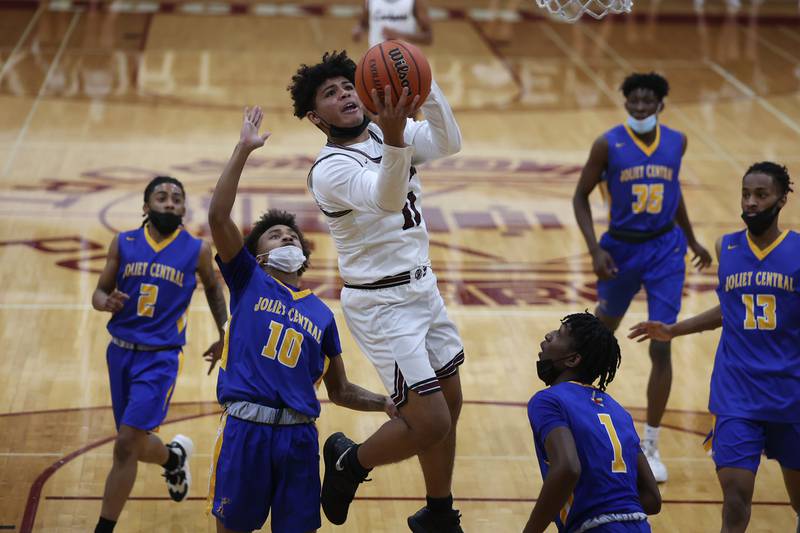 Lockport’s Anthony Munson goes in for a layup against Joliet Central. Monday, Jan. 31, 2022 in Lockport.