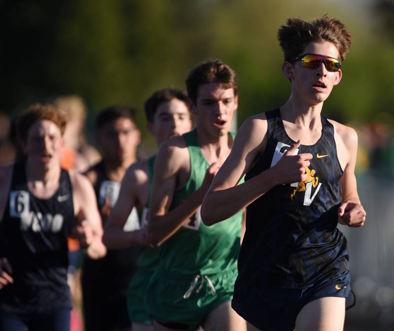 Neuqua Valley’s Jesse Gudauskas leads the pack on his way to winning the 3,200-meter relay during the DuPage County boys track and field meet at Wheaton Warrenville South High School on Friday, May 9, 2025 in Wheaton.