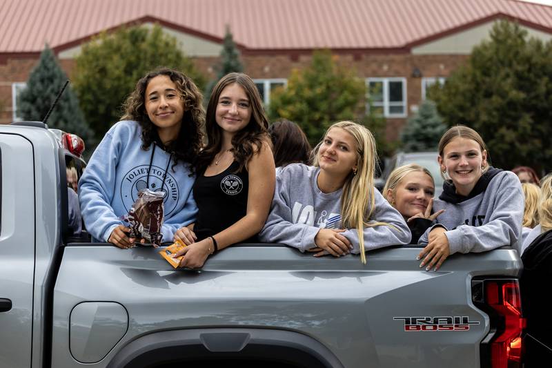 Members of the Joliet Township varsity tennis team participate in the Joliet West homecoming parade on Oct. 10, 2025.