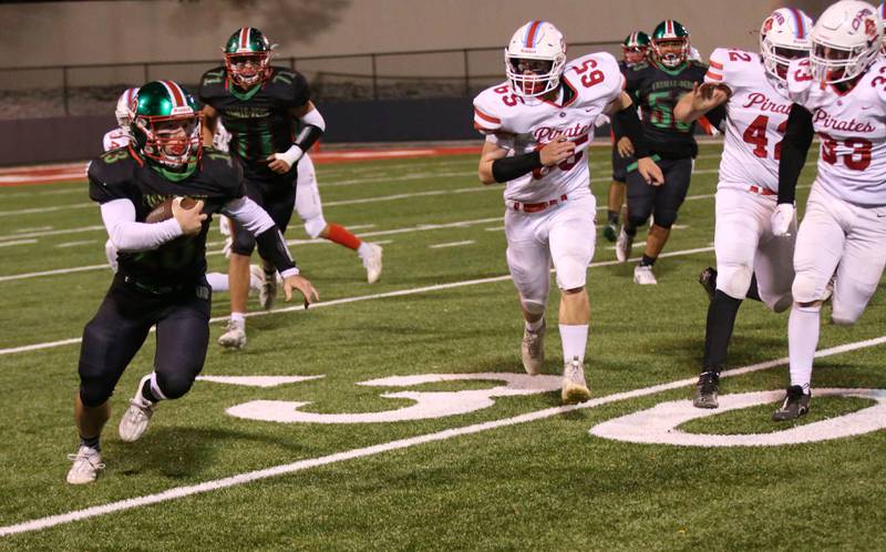 L-P's Brady Romagnoli (left) runs the ball against Ottawa defenders on Friday, Oct. 6, 2023 at Howard Fellows Stadium.