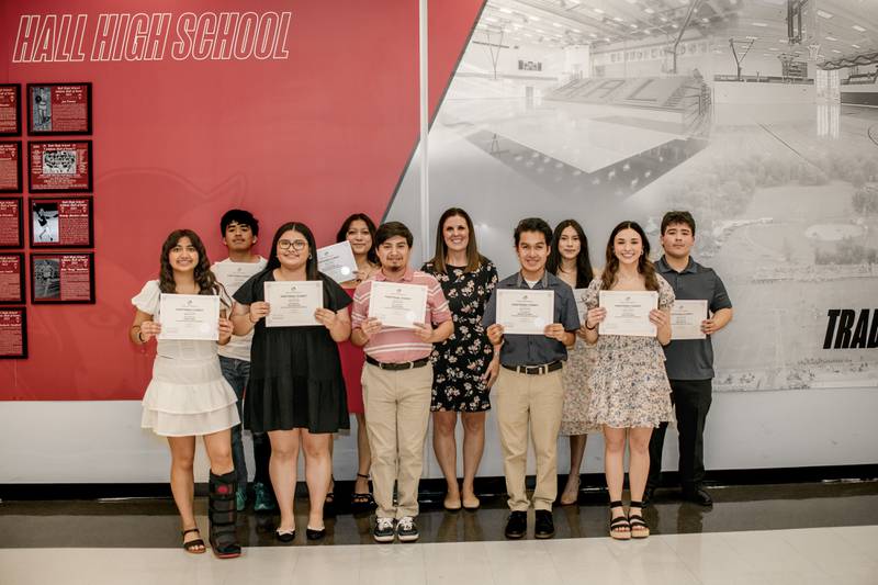 Receiving global seal are (back, from left) Eri Martinez, Sandra Quiroz-Martinez, Jenny Reyes and Javi Serrano, (front) Sandy Payan, Karen Martinez, Yovanni Perez, Michael Zaragoza and Emily Rodriguez. Not pictured is Alondra Sandoval.