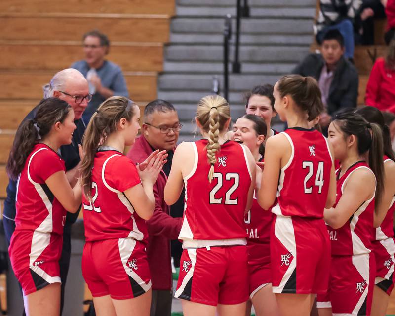 Hinsdale Central huddles before pregame introductions before their basketball game at York. Dec 8, 2023.