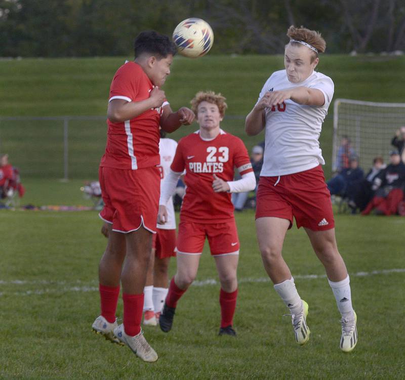 Streator’s David Paton goes up for a header against Ottawa’s Luis Bedolla during the first half of Tuesday's match at Ottawa.