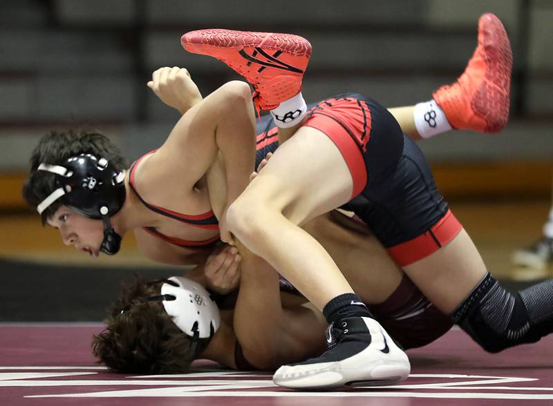 Huntley’s Noah Gutierrez pins Prairie Ridge’s Tymen Robinson during the 106-pound match of a Fox Valley Conference boys wrestling meet on Thursday, Jan. 22, 2026, at Prairie Ridge High School Crystal Lake.