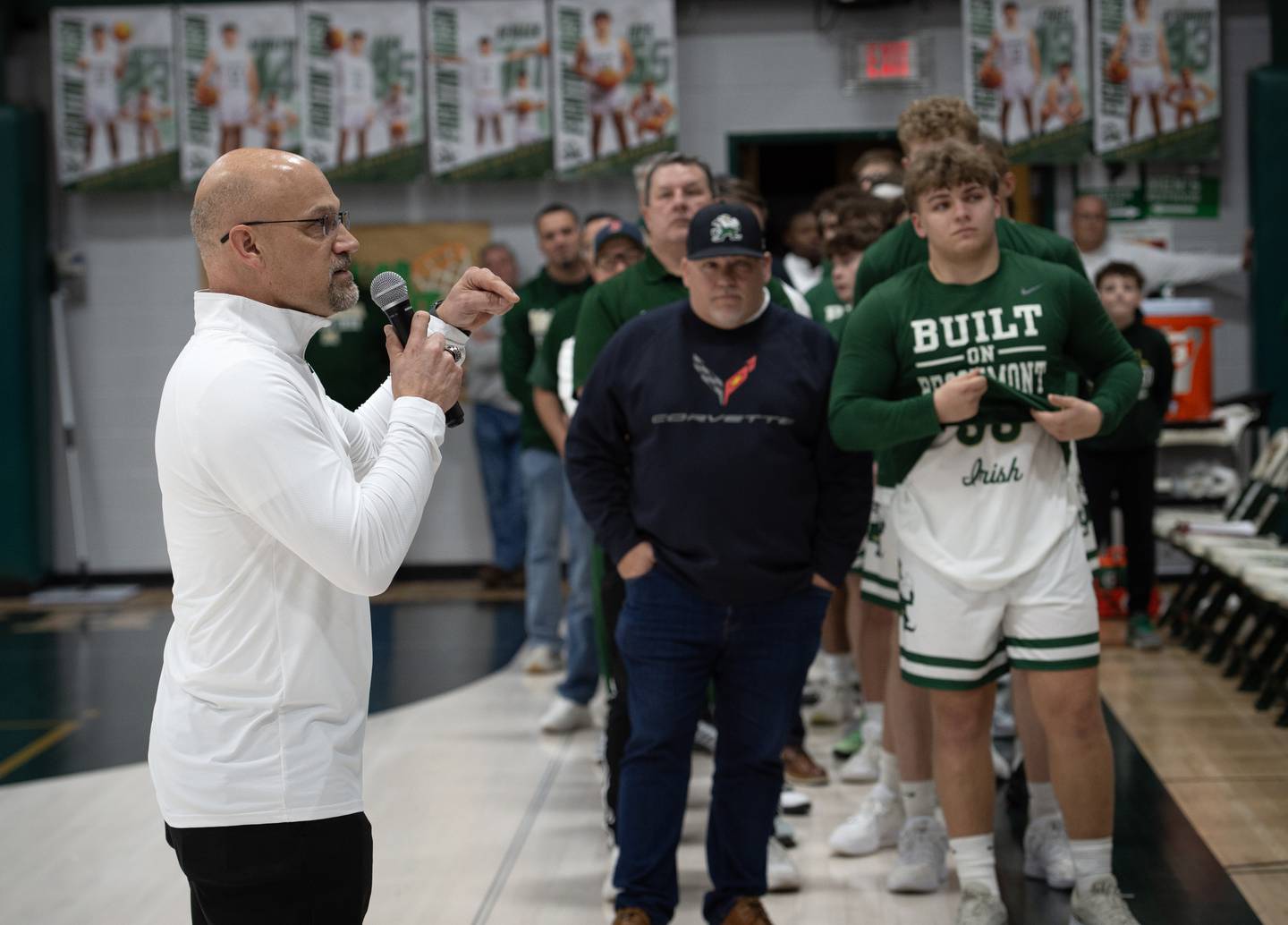 Bishop McNamara's head coach Adrian Provost speaks before the start of his last McNamara home game against Newark on Friday, Feb. 20, 2026.