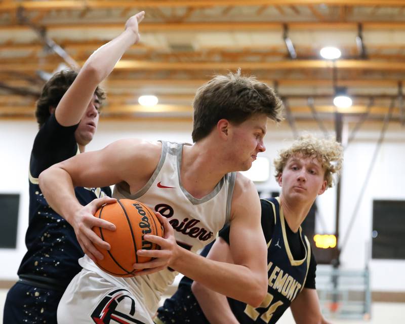 Bradley-Bourbonnais's Nick Allen (15) grabs a rebound during their WJOL Thanksgiving Classic Championship game between Bradley Bourbonnais at Lemont, Saturday November 30, 2024  in Joliet.