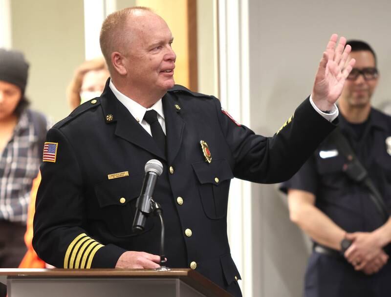 DeKalb Fire Chief Michael Thomas thanks all the firefighters in attendance after being sworn in as the city's new full-time fire chief Monday, April 11, 2022, during the DeKalb City Council meeting at the library. Thomas has been serving as the acting chief since the retirement of former chief Jeff McMaster in November.