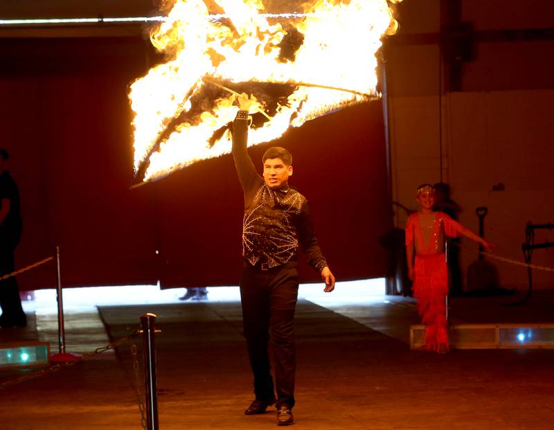 The Great Pages Circus performer does twisting and twirling artstry on Monday, June 23, 2025 at the Bureau County Fairgrounds in Princeton. The Great Pages Circus is a family-friendly, traveling circus that blends traditional circus acts with a modern, energetic style.
