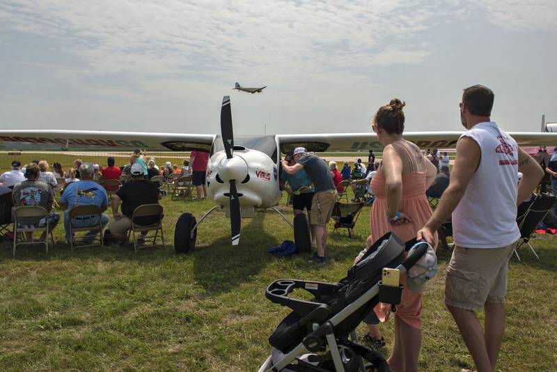 Visitors to the 2021 Aviation Content Creator Awards (ACCA) seek shelter from the heat Saturday, July 24, 2021 at the Whiteside County Airport in Rock Falls. The three day fest will bring in dozens of Youtube aviators to showcase their planes and flying techniques.