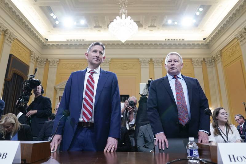 Greg Jacob, who was counsel to former Vice President Mike Pence, left, and Michael Luttig, a retired federal judge, arrive before the House select committee investigating the Jan. 6, 2021, attack on the Capitol holds a hearing at the Capitol in Washington, Thursday, June 16, 2022. (AP Photo/Susan Walsh)