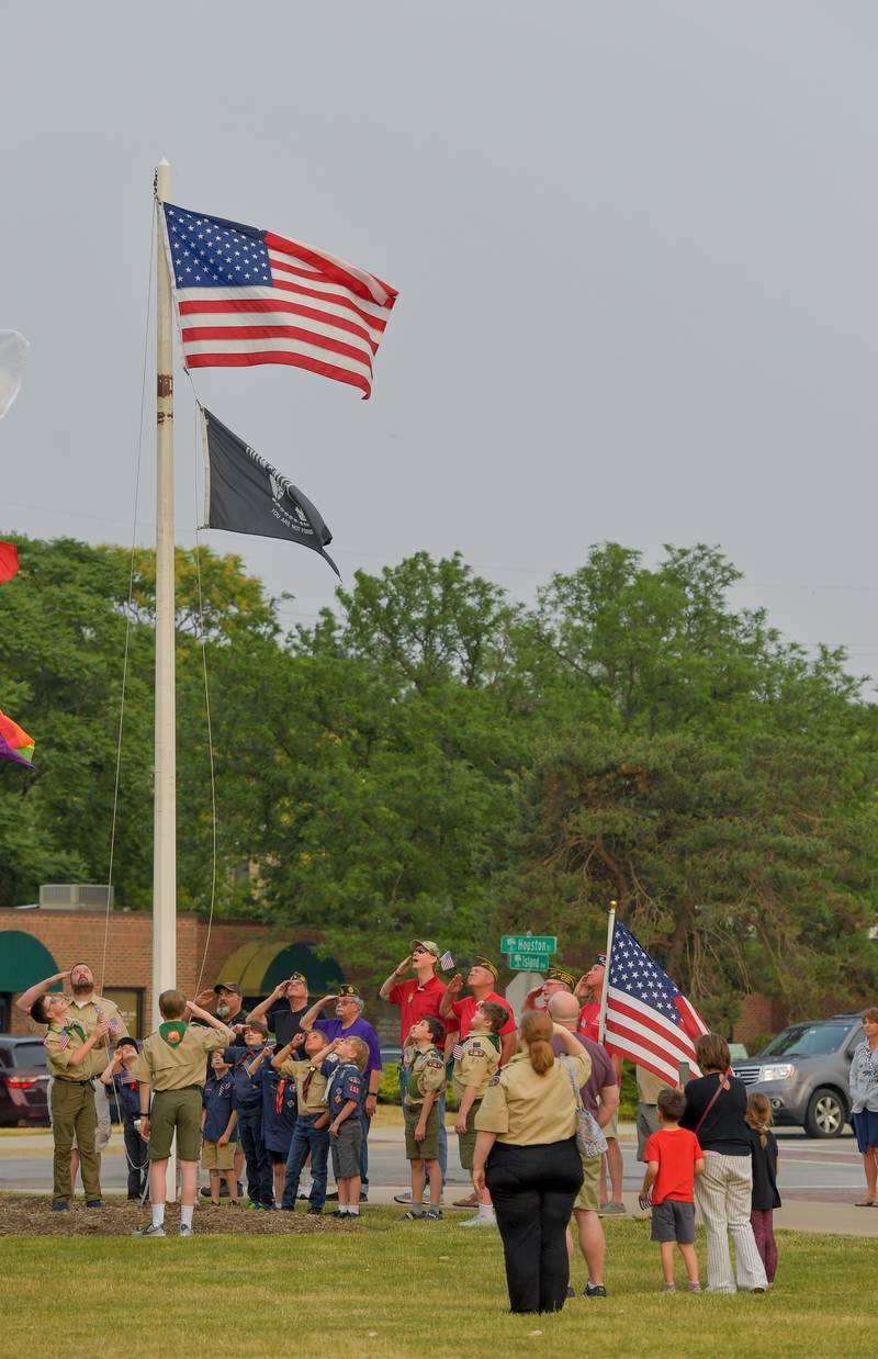 Batavia Scouts raise the U.S. and POW flags on the city flag pole during the Batavia Flag Day Ceremony on Wednesday, June 14, 2023.