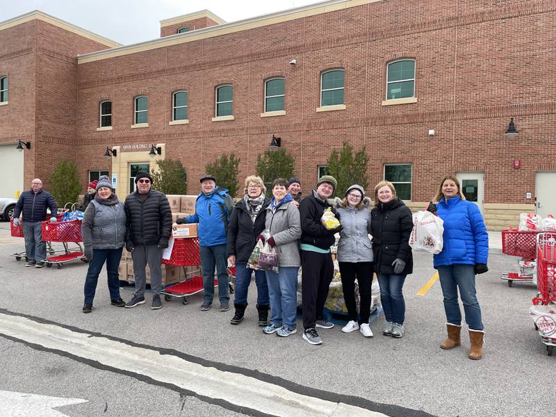 Volunteers with the Batavia Interfaith Food Pantry and Clothes Closet distributed 138 Thanksgiving meals to local families on Nov. 19, 2022. (Photo of volunteers from the 2021 meal distribution).