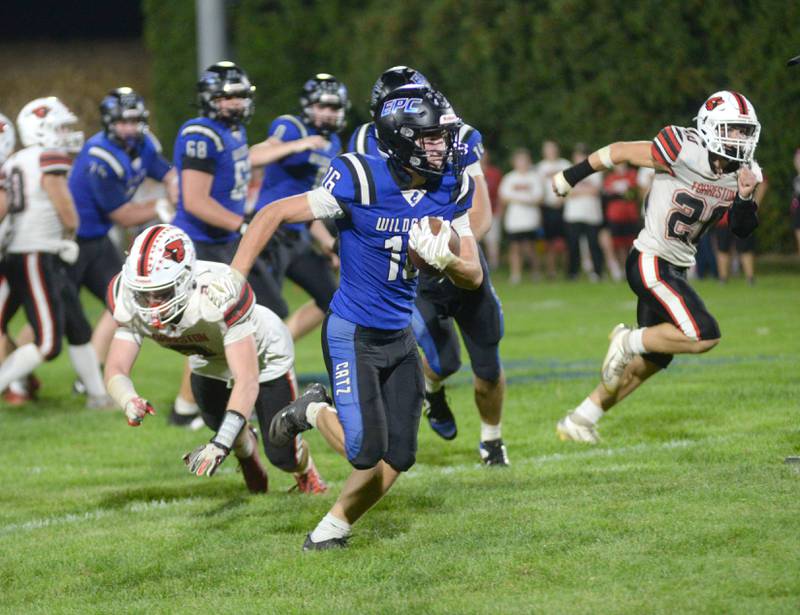 Eastland-Pearl City's Brecken Hayden (16) heads to the end zone against Forreston at Pearl City High School on Friday, Oct. 3, 2025.