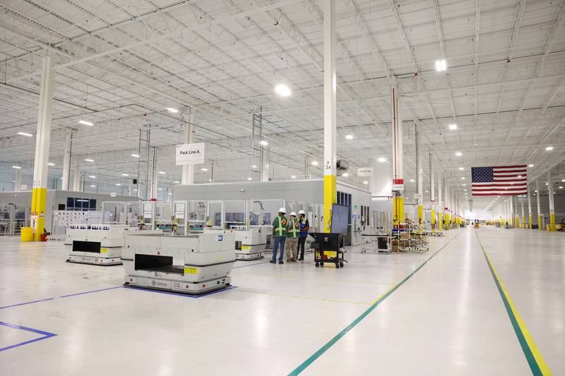 Workers tend to Pack Line A at Gotion Illinois in Manteno on Oct. 1, 2025. The battery manufacturing plant has plans to expand its workforce to 450 jobs by the end of 2025, with the goal of reaching 1,400 jobs in 2026.