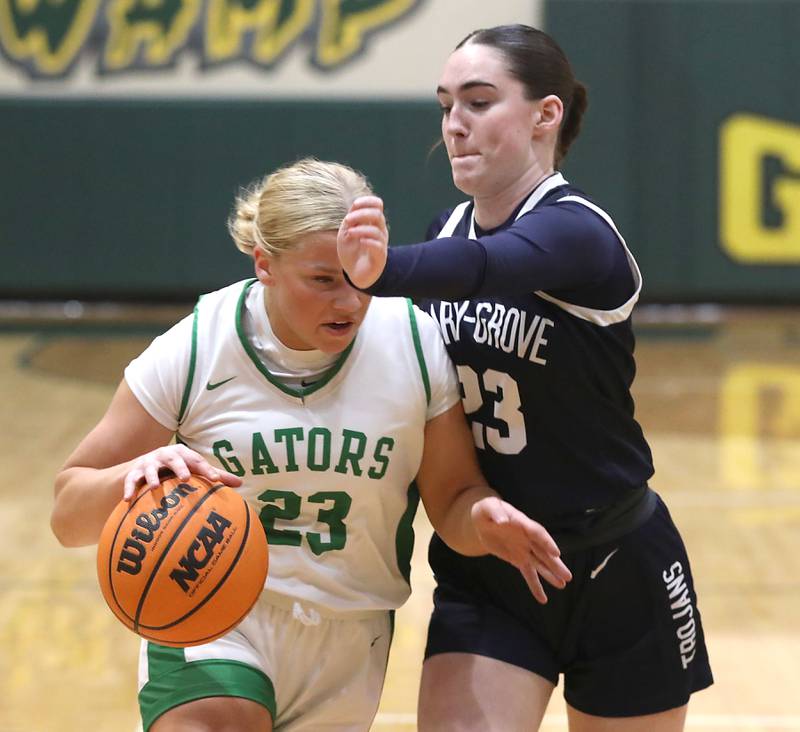 Crystal Lake South's Laken LePage drives to basket against Cary-Grove's Avery Hoffman during a Fox Valley Conference girls basketball game on Friday, Jan. 23, 2026, at Crystal Lake South High School.