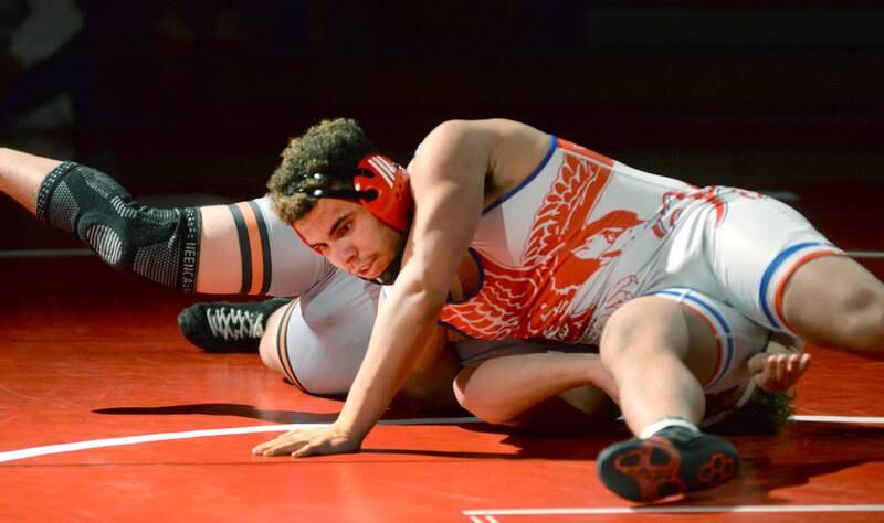 Oregon's Andrew Young wrestles a Sandwich opponent in the 175-pound match at a triangular meet with Morrison on Friday, Jan. 31, 2025 in the Blackhawk Center at Oregon High School.