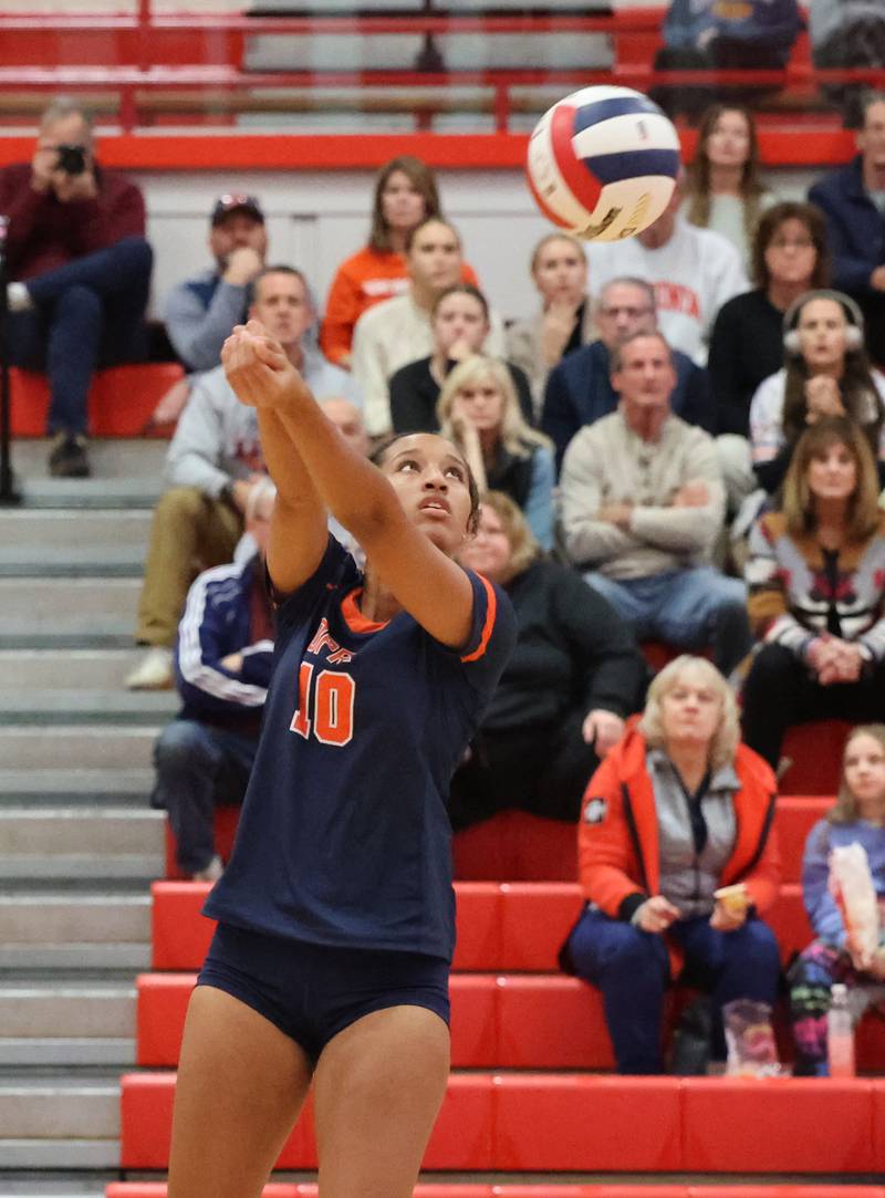 Oak Park-River Forest’s Tewabech Woodson (10) sets the ball against Willowbrook during the 4A girls varsity volleyball sectional final match at Hinsdale Central high school on Wednesday, Nov. 1, 2023 in Hinsdale, IL.