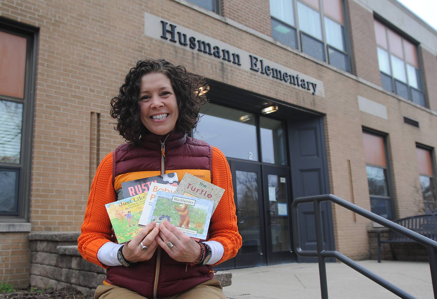 Mal Keenan, who has served as the Reading Recovery teacher for Crystal Lake Elementary School District 47, outside one of the schools she travels between to help students. Reading Recovery is a research-based, short-term intervention delivered one-on-one for first-grade students.