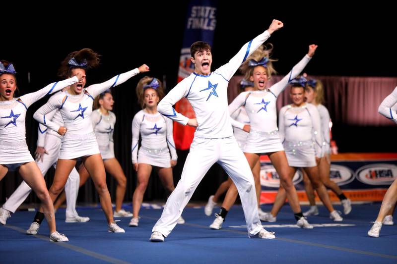 Members of the St. Charles North cheerleading team compete in the coed team division of the IHSA State Finals on Saturday, Feb. 8, 2025 at Grossinger Motors Arena in Bloomington.