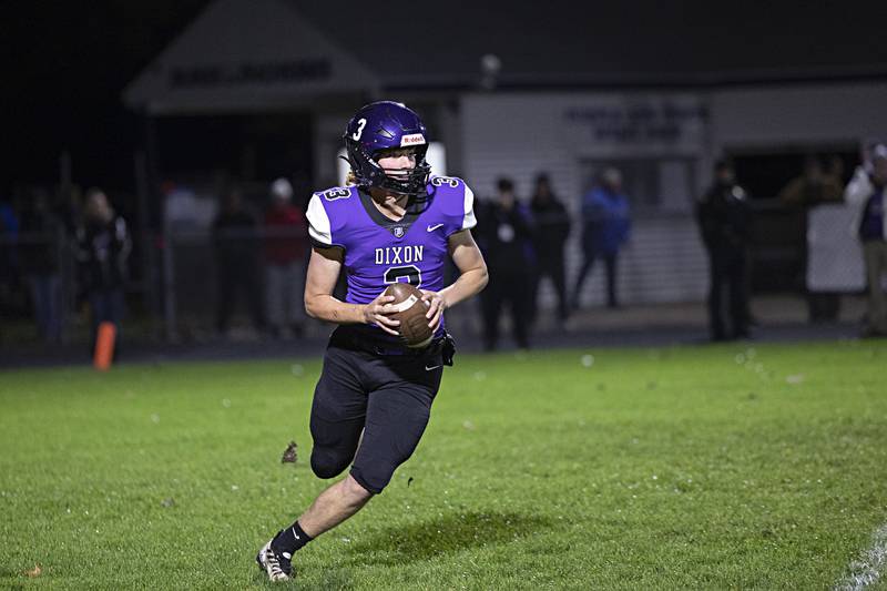 Dixon’s Tyler Shane looks to pass against Plano Friday, Oct. 27, 2023 in Dixon.