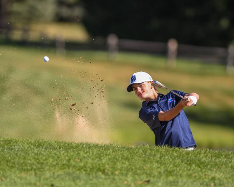Oswego's Carter Anderson hits out of the sand trap on Monday Oct. 7, 2024, during the 3A sectional match held at Blackberry Oaks Golf Course in Bristol.