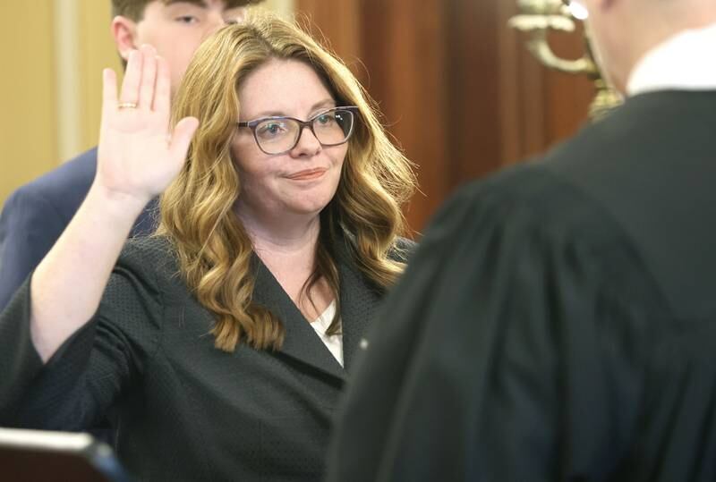 Sarah Gallagher Chami is sworn in as an associate judge of the 23rd Judicial Circuit by Chief Judge Bradley Waller of the 23rd Judicial Circuit Friday May 6, 2022, at the DeKalb County Courthouse in Sycamore.