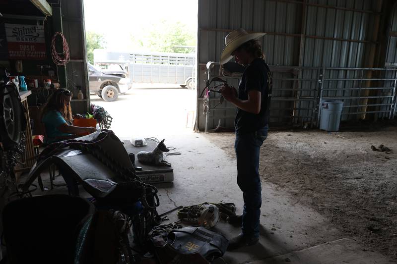 Dominic Dubberstine-Ellerbrock collects his gear for his bull riding practice at Rugged Cross Cattle Company. Dominic will be competing in the 2022 National High School Finals Rodeo Bull Riding event on July 17th through the 23rd in Wyoming. Thursday, June 30, 2022 in Grand Ridge.