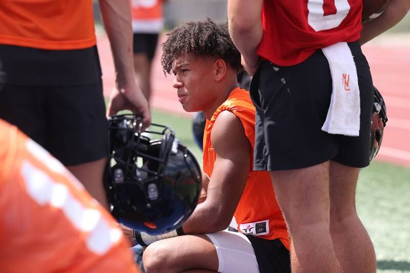 Lincoln-Way West wideout Austin Rowswell watches the defense take reps during a 7-on-7 scrimmage at Lincoln-Way East on Tuesday, July 18th, 2023 in Frankfort.