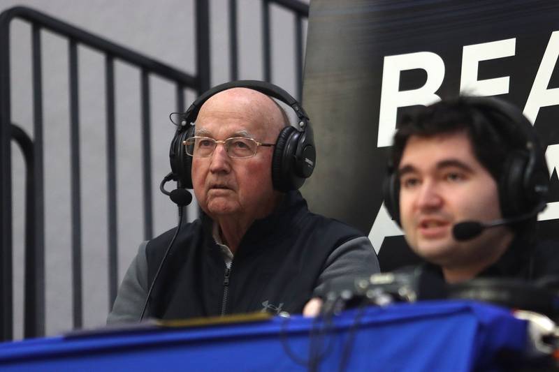 Jim Hinkle works the broadcast booth as Jacobs faces Grayslake Central in varsity boys basketball Hinkle Holiday Classic action on Tuesday, Dec. 23, 2025, at Jacobs High School in Algonquin.