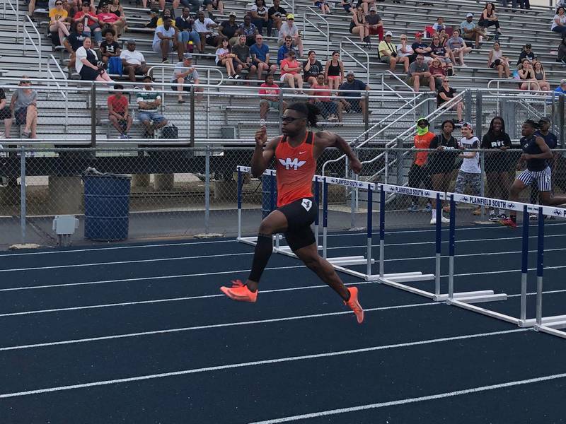 Minooka's Collin Forrest runs away from the field to win the 110-meter high hurdles at the Southwest Prairie Conference track meet on Wednesday at Plainfield South. Forrest also won the 300 hurdles and was part of the winning 4x200 relay.