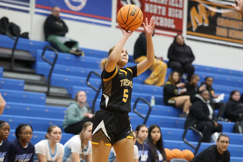 Joliet West’s Niyonna Reddington hits the three-point shot against Plainfield South on Thursday, Jan 22, 2026 in Plainfield.