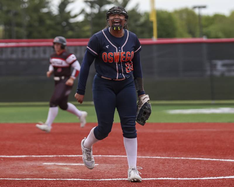 Oswego's Jaelynn Anthony (20) celebrates getting out of a jam during softball game between Oswego at Yorkville. May 5, 2026 in Yorkville.