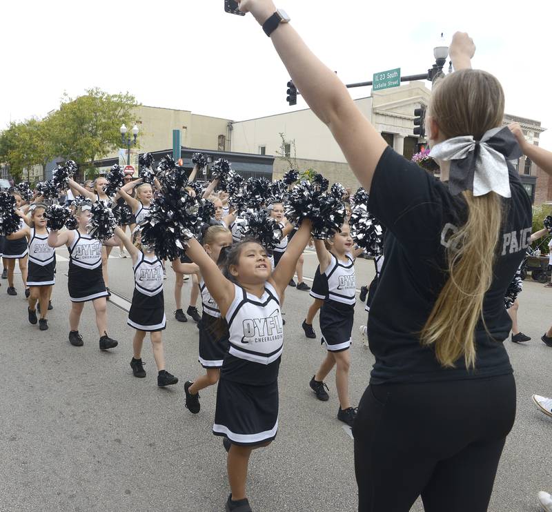 The Ottawa Youth Football League cheerleaders rev up the crowd Sunday, Sept. 29, 2024, during Ottawa’s Fall Fest Parade.