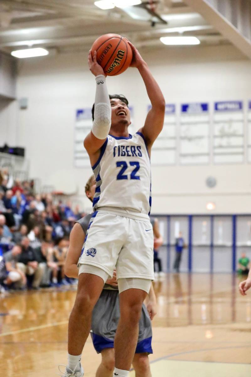 Princeton's Christian Rosario shoots against Newman Friday night at Prouty Gym.