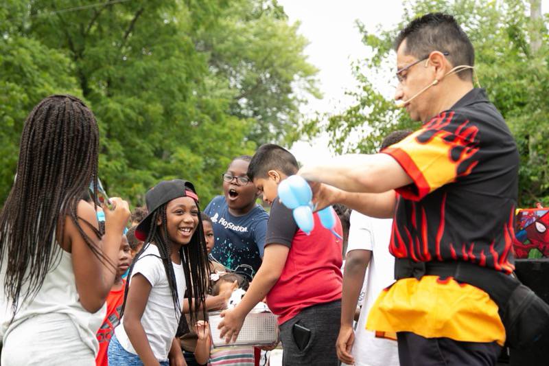 Joliet Unity Movement held its Annual 815 Youth Day on Sunday August 14, 2022, at Cutter Park in Joliet. The event included resources from community-based organization, dance competition, talent showcase, gymnastics, 3 on 3 Basketball Tournament, magic show, character balloons and giveaways: T-shirts, book bags and care packages.
