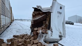 Semi hauling Hamburger Helper hit by train east of Franklin Grove