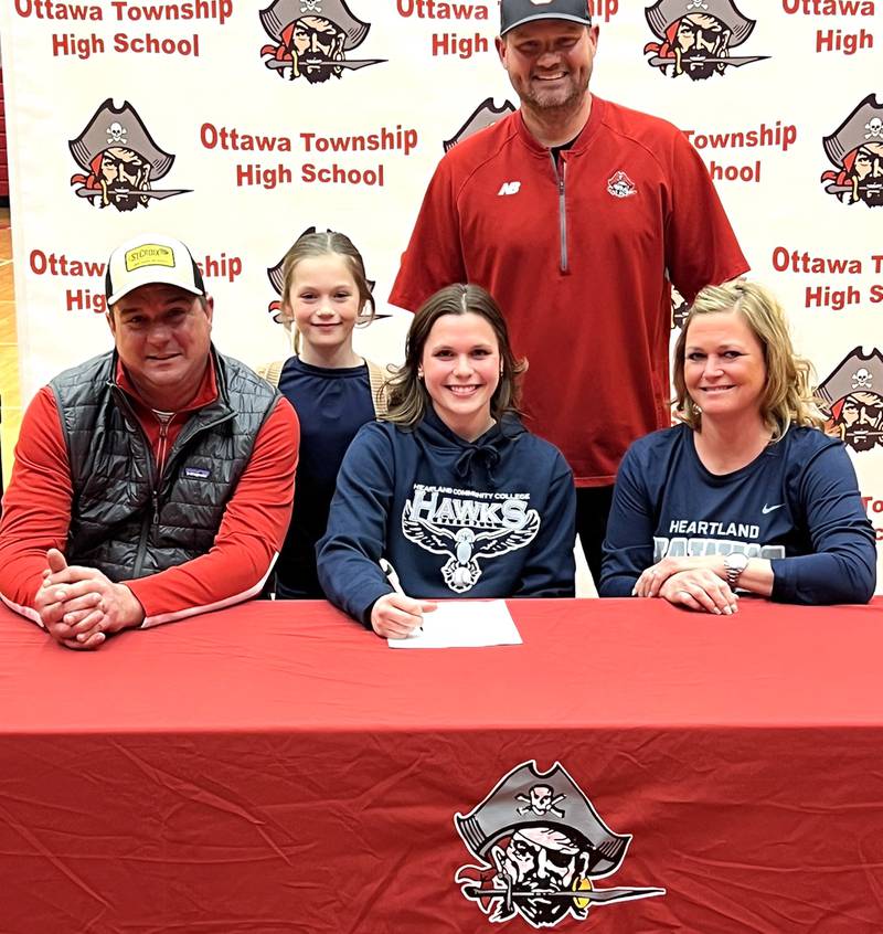 Ottawa multi-sport star Kendall Lowery has chosen to continue her education at Heartland Community College in Normal and her softball career at the NJCAA level with the Hawks. Lowery – a second-team member of the 2023-24 Times All-Area Girls Basketball Team and first-team selection on the 2024 Times All-Area Softball Team – is pictured at her signing ceremony alongside family and Ottawa softball coach Adam Lewis (back row, right).