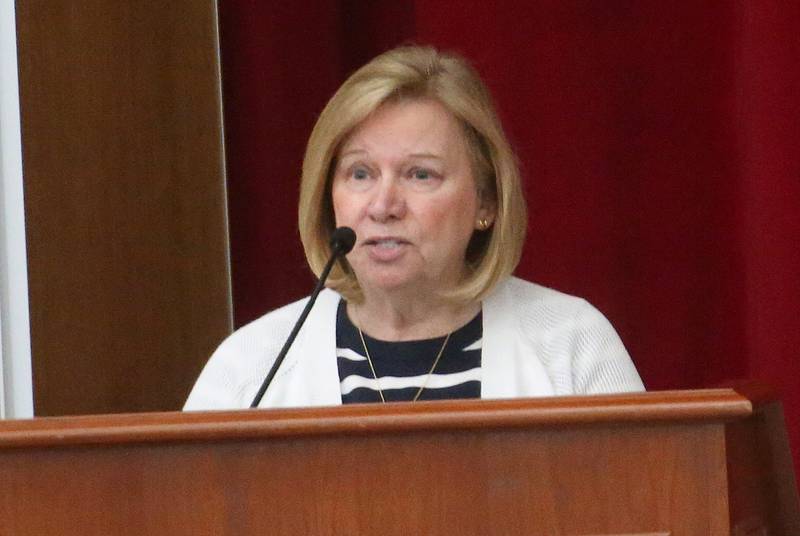 Julie Polancic speaks to the Illinois Health Facilities and Services Review Board during a public hearing regarding OSF St. Elizabeth Hospital's plans to reduce services on Tuesday, June 10, at Central Intermediate School in Ottawa.