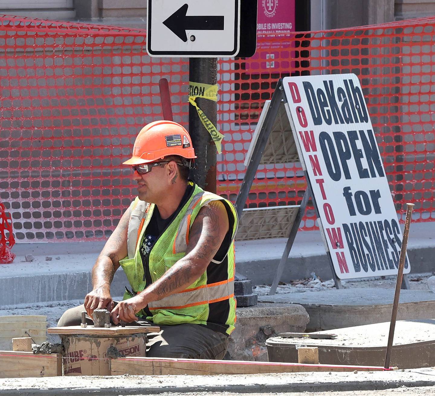 Work continues in front of City Hall on the south side of Lincoln Highway Wednesday June 29, 2022, in DeKalb. Downtown businesses remain open as the construction continues on Lincoln Highway between First and Fourth Streets.