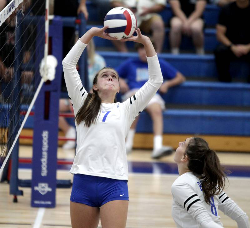 Rosary’s Molly Lambert sets the ball during a game against St. Charles North in Aurora on Monday, Aug. 21, 2023.