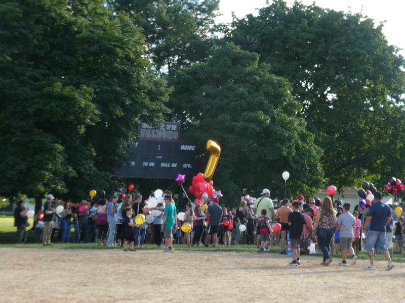 A prayer vigil and balloon release was held at Oriole Park in Chicago on Monday night, August 1, 2022 to mourn the loss of seven killed, including Lauren Dobosz and her four children, in a tragic car crash that occurred Sunday on I-90 near Hampshire.