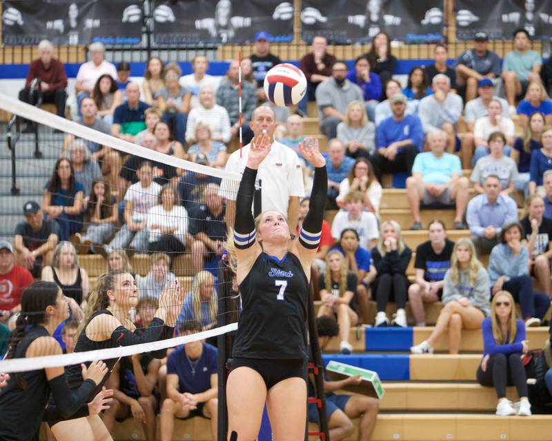St. Charles North's Mia McCall sets the ball against Benet on Monday, Oct. 6, 2025 in St. Charles.