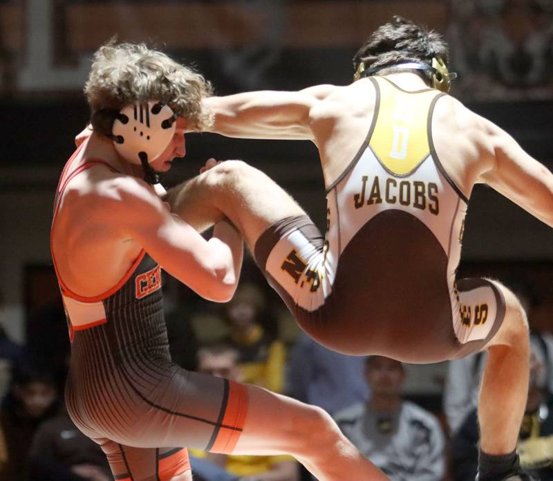 Crystal Lake Central’s Daniel Zuehlke brings down Jacobs’ Andrew Vormittag at 138 pounds in varsity boys wrestling on Tuesday, Jan. 20, 2026 at Crystal Lake Central High School in Crystal Lake.