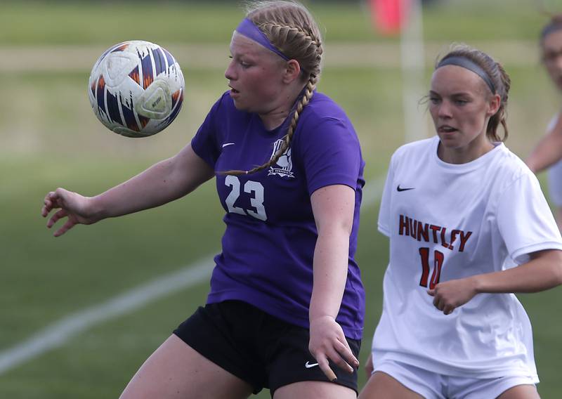 Hampshire's Madison Koth controls the ball in front of Huntley's Kylie Lucas during a Fox Valley Conference soccer game on Tuesday, April 23, 2024, at Hampshire High School.