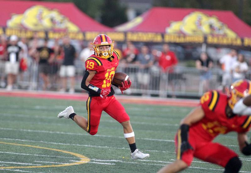 Batavia’s Zach Granberg runs the ball during the season-opener against Phillips in Batavia on Friday, Aug. 25, 2023.