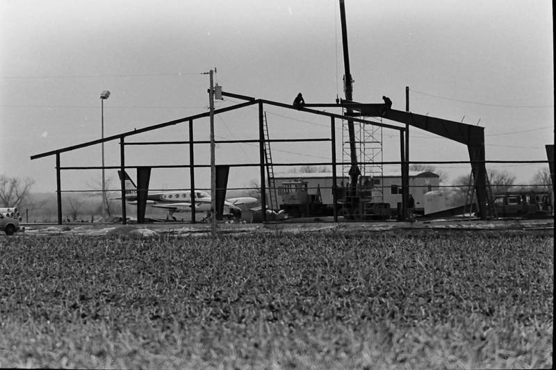 A view of crews building the frame of the second airplane hanger in January 1986 at the Illinois Valley Regional Airport in Peru.